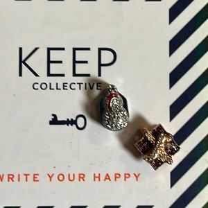 Keep collective holiday charms. Silver snowman and rose gold present.